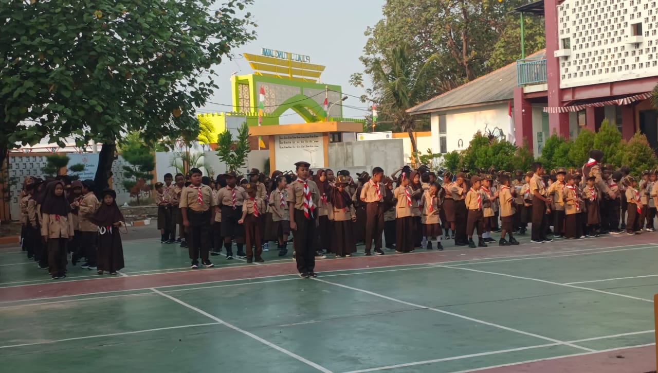 Bhabinkamtibmas Polres Kepulauan Seribu Memperingati Hari Pramuka ke-62 di SDN 02 PG Pulau Untung Jawa