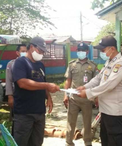 Terus Cegah COVID-19, Sebanyak 800 Masker dibagikan Polres Kep Seribu ke Warga di 8 Pulau
