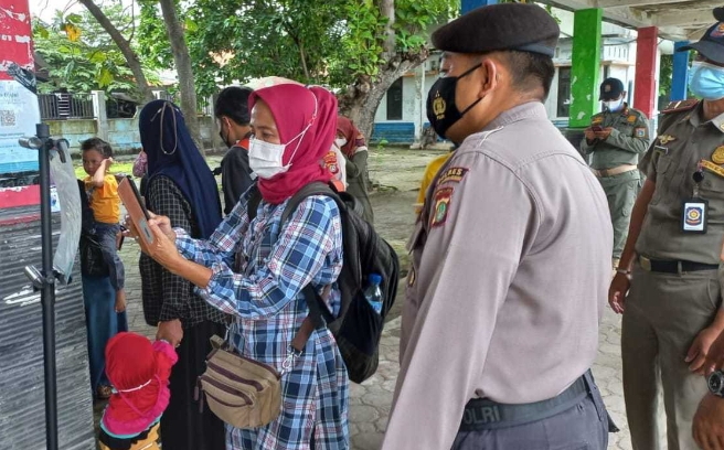 Semua Penumpang Kapal Yang Tiba di Pulau Tidung Wajib Scan PeduliLindungi dan Taat ProKes