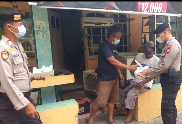 Cegah Sebaran Covid-19, sebanyak 1.600 Masker di Bagikan ke Warga oleh Polres Kep Seribu